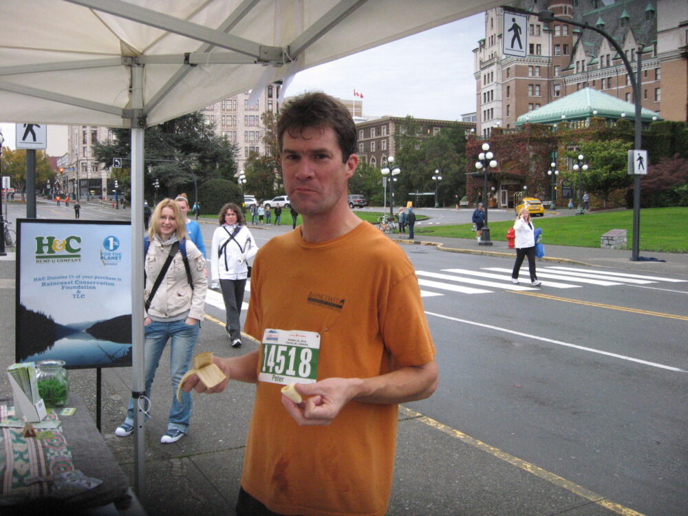 A man wearing an orange shirt.