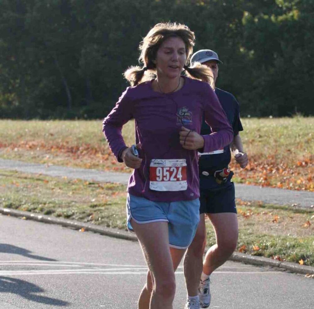 A woman running in a race.