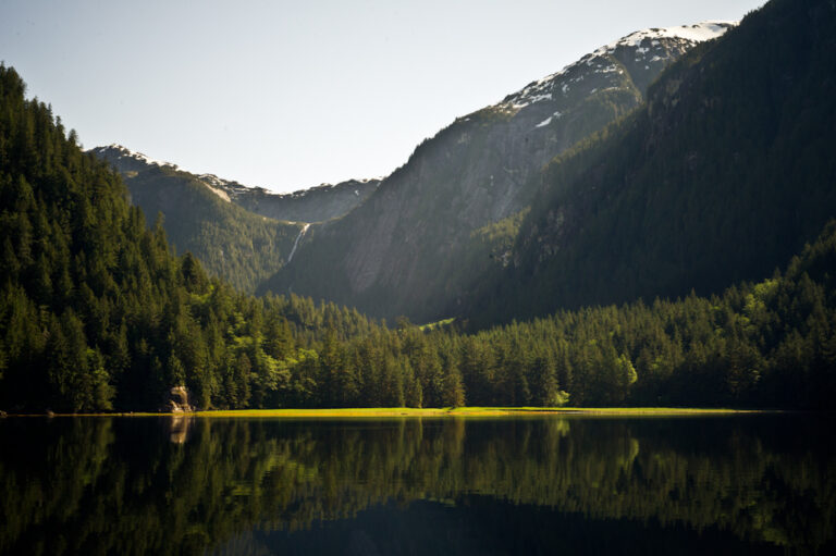 A lake surrounded by mountains.