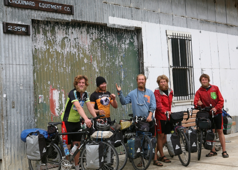 A group of people standing in front of a building.