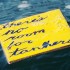 A drift card in water with the message "there's no room for tankers"