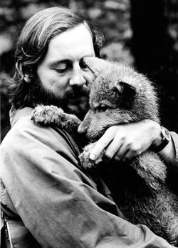 Dr. Paul Paquet holding a wolf pup. This picture was taken in 1973.