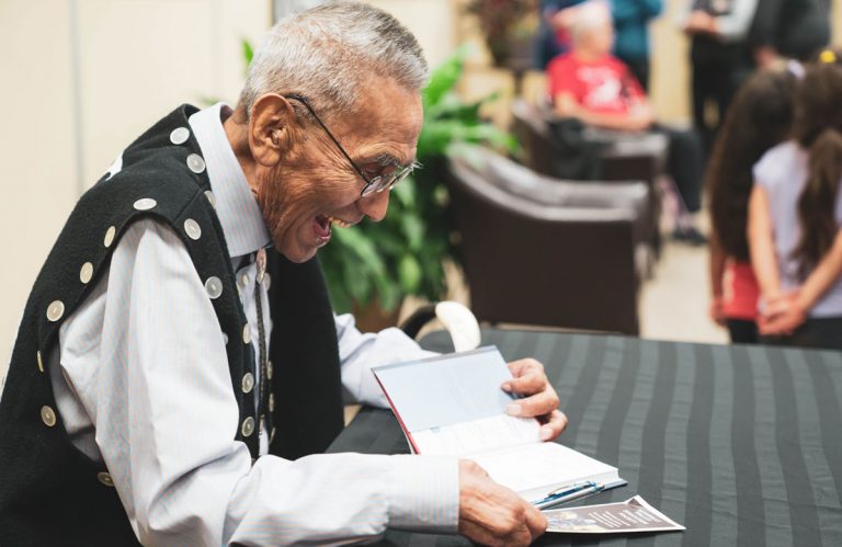 Cecil Paul, Xenaksiala elder, at a book signing in Kitimat Valley.