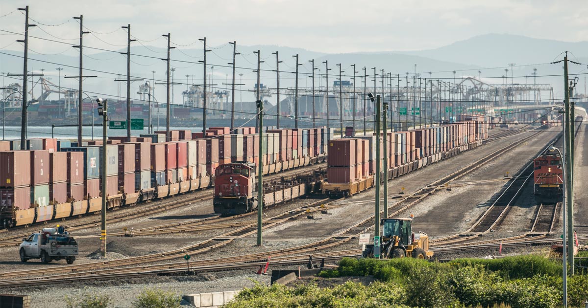 The trains and containers on the causeway to Terminal 2.