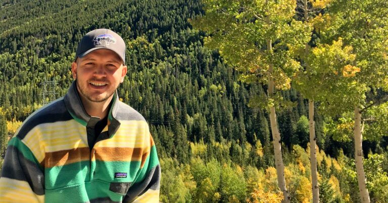 Denis Tuzinovic in the sunshine with his Patagonia hat on.