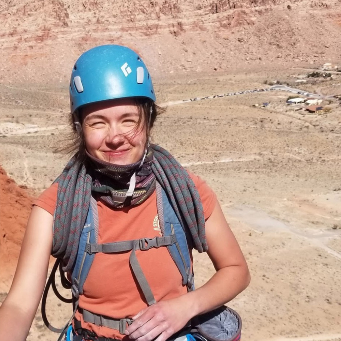 Woman named Jessica with rock climbing gear on.