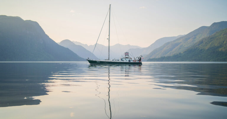 Achiever in the sunset on a calm ocean.