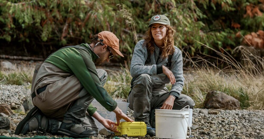 Jessica Hutchinson, executive director of Redd Fish Restoration, working outdoors, on the water, always smiling.