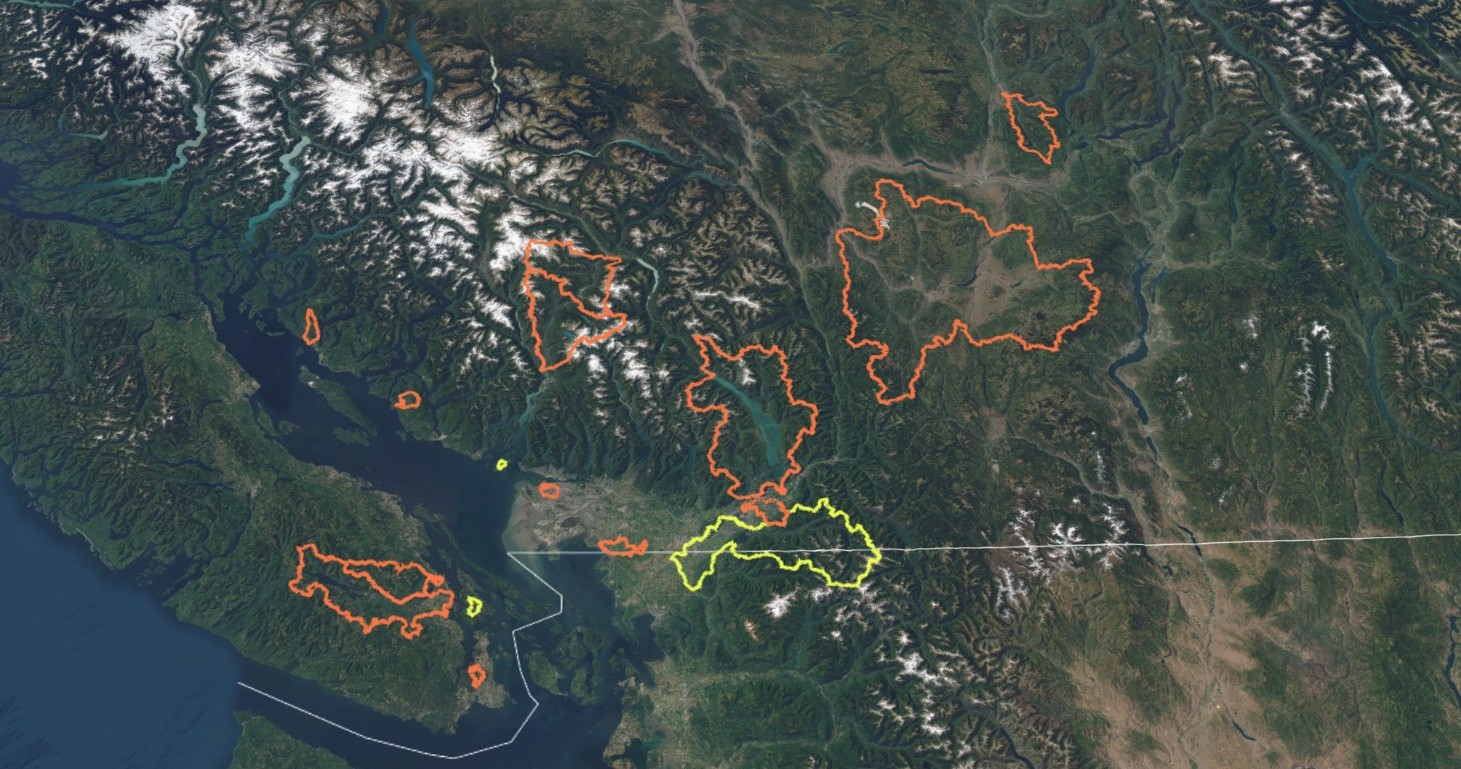 Map with a satellite imagery basemap showing the 12 partner watersheds in orange and 3 accessory watersheds in yellow.