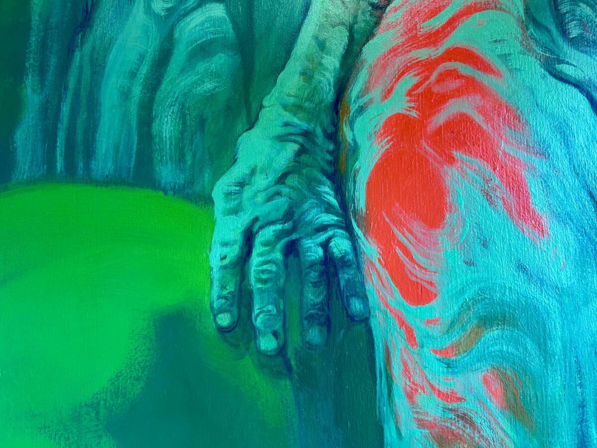 A close up image of a hand that is part of a painted mural.