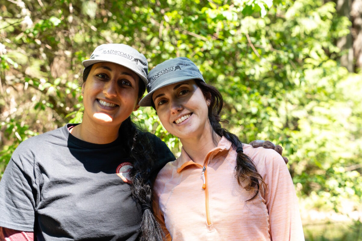 Two Raincoast staff smiling to the camera